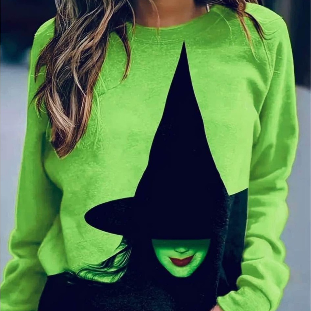 New. Green & Black “WICKED” knit top. Size XXL